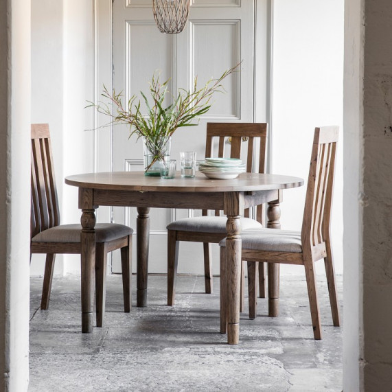 Rustic oak extending dining table round